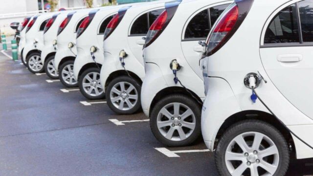 fleet-of-electric-vehicles-plugged-in-xlarge